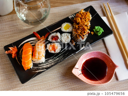 Set of different sushi - maki, california and nigiri. Japanese cuisine Set of different sushi - maki, california and nigiri. Japanese cuisine 105479656