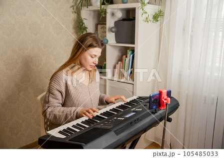 Live streaming concert. Teacher teaching to play piano online. Live streaming concert. Teacher teaching to play piano online. 105485033