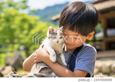 猫を可愛がる少年 105488080