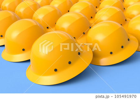 Set of safety helmets or hard caps for carpentry work in row on blue background 105491970