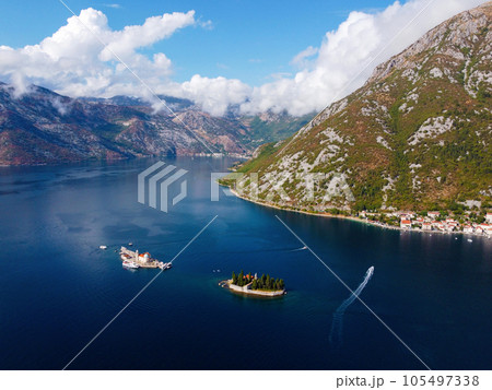 Aerial view of Our Lady of the Rocks or Gospa od Skrpjela and Catholic monastery Saint George in the bay of Kotor, in city of Perast, Adriatic sea, Montenegro. Tourism destination 105497338