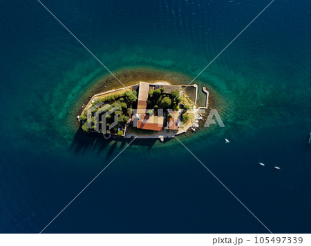 Aerial view of Our Lady of the Rocks or Gospa od Skrpjela and Catholic monastery Saint George in the bay of Kotor, in city of Perast, Adriatic sea, Montenegro. Tourism destination 105497339
