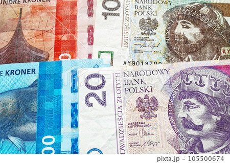 Stack of Norwegian Krone and Polish Zloty 105500674
