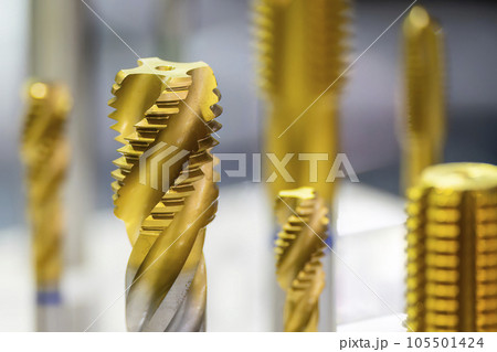 Close up of the special machine tapping tool. 105501424