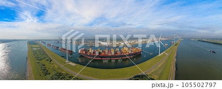 Panoramic drone picture from port Rotterdam with big container ship 105502797
