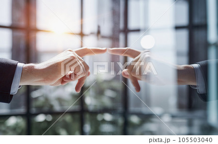 successful businessman touching his finger to the glass Board. 105503040