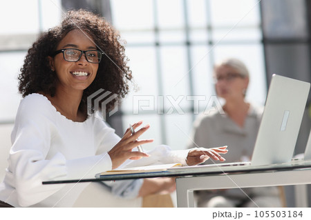 young attractive african american woman in the office young attractive african american woman in the office 105503184