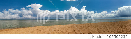 Beach on tropical island. Clear blue water, sand, clouds. Breathtaking view of ocean. Amazing vacation spot 105503233