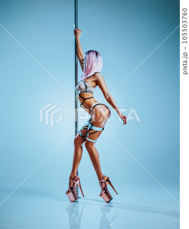 Woman poledancing Woman poledancing 105503760