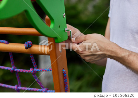 Dad collects wooden home sports complex outdoor. 105506220