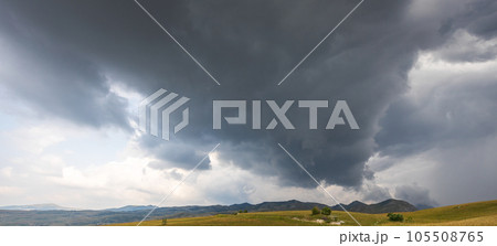 Heavy stormy gray clouds in the sky Heavy stormy gray clouds in the sky 105508765