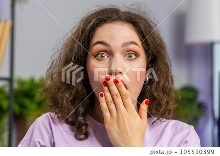 Excited happy woman surprised, shocked by sudden victory, good win news, celebrating, wow reaction 105510399