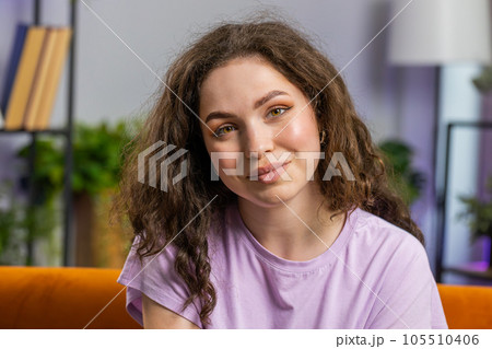 Happy calm woman smiling friendly, glad expression, feel satisfied concept good news, celebrate win Happy calm woman smiling friendly, glad expression, feel satisfied concept good news, celebrate win 105510406