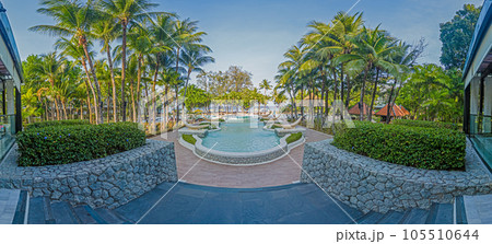 Panoramic view over tropical pool landscape of luxury hotel Panoramic view over tropical pool landscape of luxury hotel 105510644