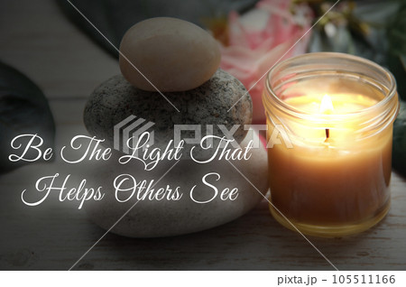 Motivational and inspirational quote - Be the light that helps others see text with zen stones background. Motivational concept. Motivational and inspirational quote - Be the light that helps others see text with zen stones background. Motivational concept. 105511166