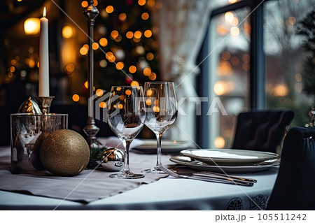 Christmas table setting with red and golden decoration. Xmas dinner. Generative AI. 105511242