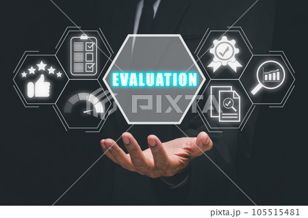 Evaluation concept, Business person hand holding evaluation icon on virtual screen. 105515481
