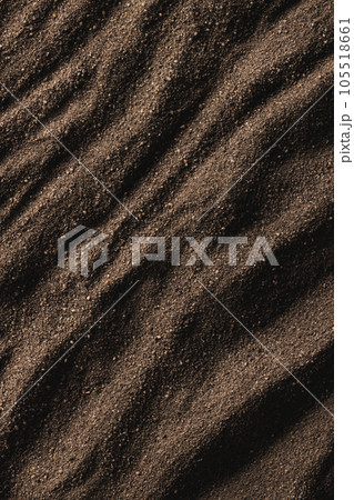 Close up of pattern of brown sand and copy space background Close up of pattern of brown sand and copy space background 105518661