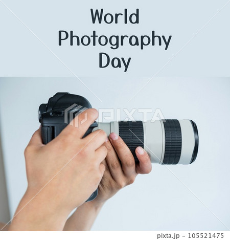 World photography day text in black over hands of caucasian man holding camera 105521475