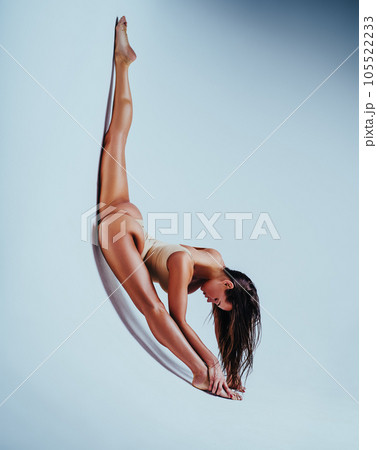 Woman gymnast stretching 105522233