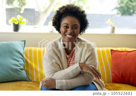 Happy plus size african american woman making - Stock Photo [105522681]  - PIXTA