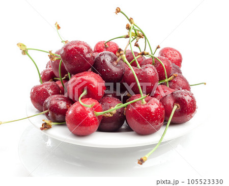 Domestic fresh cherry jam on a rustic wooden board 105523330