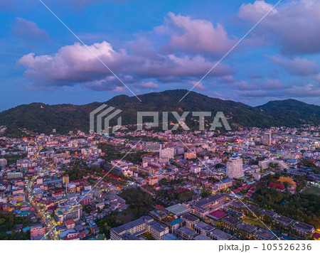 The sky changes color from yellow to red as the sun sets over the sea..sunset landscape amazing light of nature cloudscape sky. .Big sun and red lighting sky background. 4k resolution 105526236