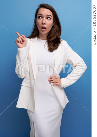 smart european pretty brunette young woman in dress and jacket smart european pretty brunette young woman in dress and jacket 105527607