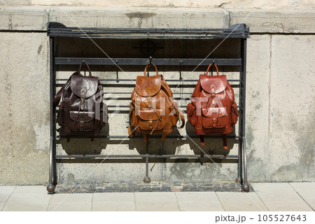 Collection of different stylish backpacks. Street photo Collection of different stylish backpacks. Street photo 105527643