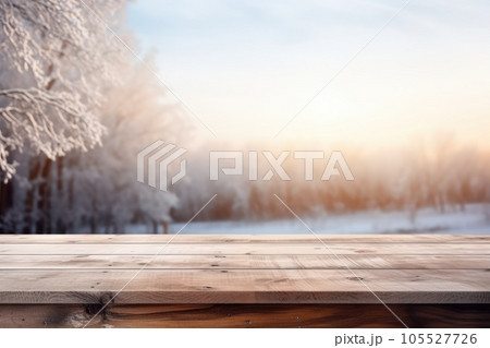 Wooden table top on blurred background of winter landscape - for display your products 105527726