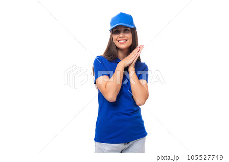pretty friendly young woman in blue cotton t-shirt and cap with merch perspective pretty friendly young woman in blue cotton t-shirt and cap with merch perspective 105527749