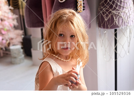 Nice little girl in the dressing room 105529316