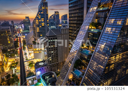 Aerial view of Ploenchit road by night in Bangkok Downtown, financial district and business center Aerial view of Ploenchit road by night in Bangkok Downtown, financial district and business center 105531324