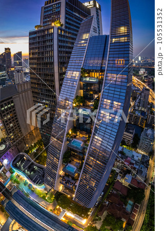 Aerial view of Ploenchit road by night in Bangkok Downtown, financial district and business center Aerial view of Ploenchit road by night in Bangkok Downtown, financial district and business center 105531352