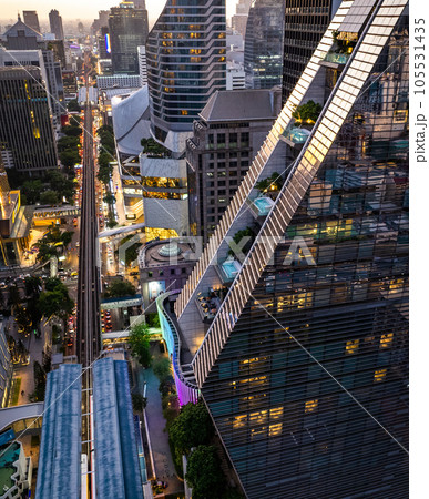 Aerial view of Ploenchit road by night in Bangkok Downtown, financial district and business center Aerial view of Ploenchit road by night in Bangkok Downtown, financial district and business center 105531435