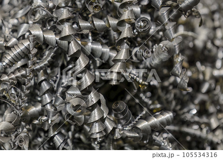 Close-up scene of the metal materials scrap from turning process. Close-up scene of the metal materials scrap from turning process. 105534316