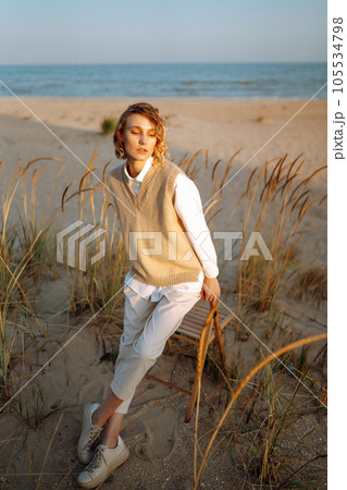 Portrait of elegant, luxury woman posing in nature. People, lifestyle, relaxation concept. 105534798