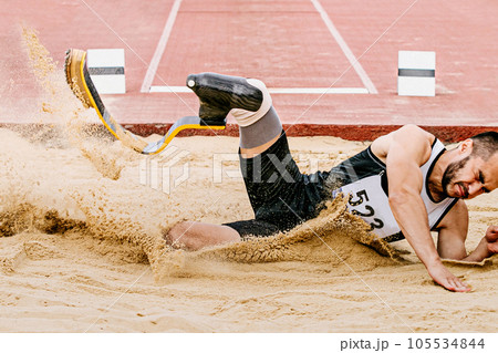 para athlete long jump, landing sand in athletics competition, summer sports games para athlete long jump, landing sand in athletics competition, summer sports games 105534844