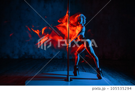 Young woman pole dancer 105535294