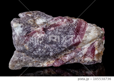 macro mineral tourmaline stone on black background macro mineral tourmaline stone on black background 105538736
