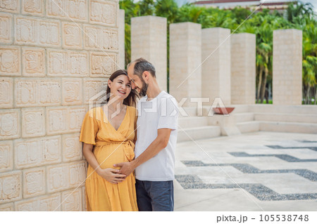 A loving couple in their 40s cherishing the miracle of childbirth in Mexico, embracing the journey of parenthood with joy and anticipation 105538748