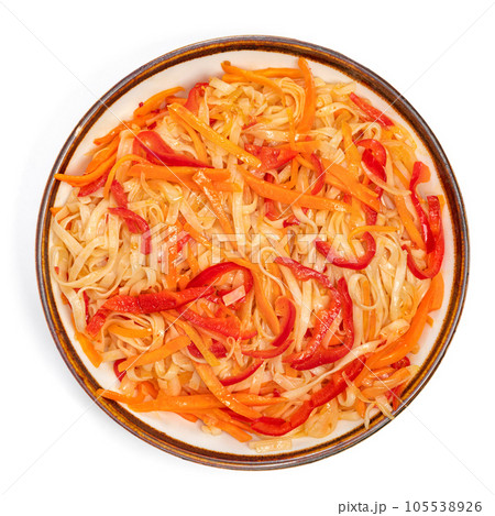 Udon noodles with chicken teriyaki, vegetables and sesame seeds. Asian cuisine. Dish on white background. 105538926