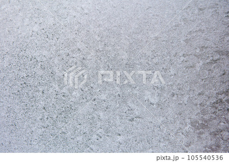 Frozen window glass on cold winter day. 105540536