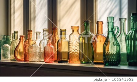 Row of colorful glass bottles on window sill. Vintage multicolored bottles in rays of sun. Generative AI 105541955