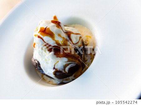 Chocolate brownie with ice cream 105542274
