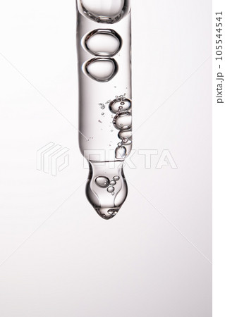 Pipette with serum, gel, oil or other cosmetic product. Pipette with serum, gel, oil or other cosmetic product. 105544541