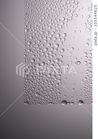 Drops of water on a transparent gray background. Drops of water on a transparent gray background. 105544620