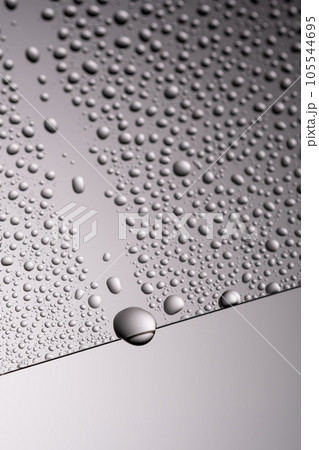 Drops of water on a transparent gray background. 105544695