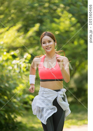 beautiful woman running in the park beautiful woman running in the park 105560466