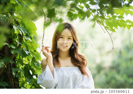 a beautiful woman in the forest 105560611
